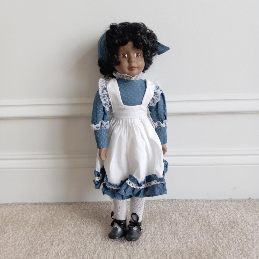 African American Porcelain Doll in the original box.